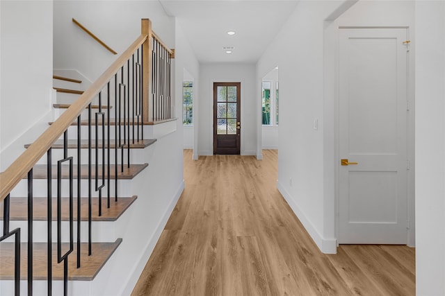 foyer entrance featuring light wood-type flooring