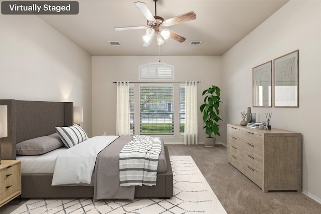 carpeted bedroom featuring ceiling fan