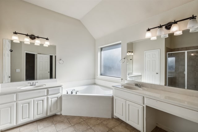 bathroom with vanity, independent shower and bath, lofted ceiling, and tile patterned flooring