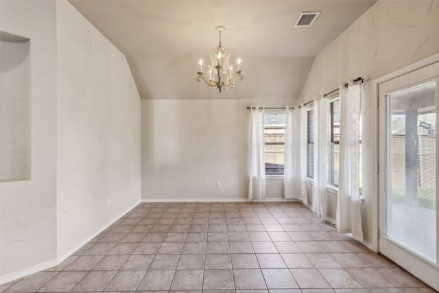 tiled empty room featuring an inviting chandelier and vaulted ceiling