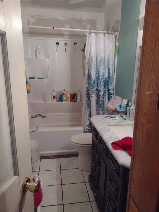 full bathroom with vanity, shower / tub combo with curtain, toilet, and tile patterned floors