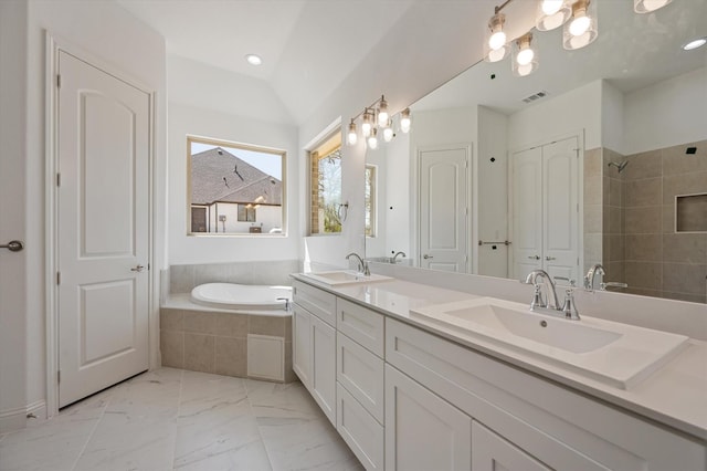 bathroom with vanity, plus walk in shower, and vaulted ceiling