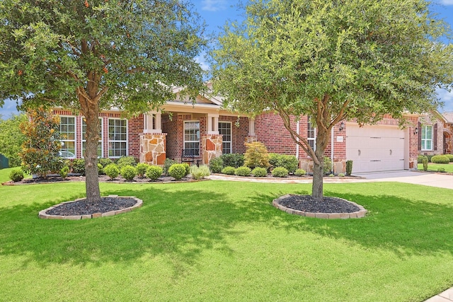 view of front of house with a front lawn and a garage