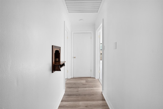 corridor featuring light wood-type flooring