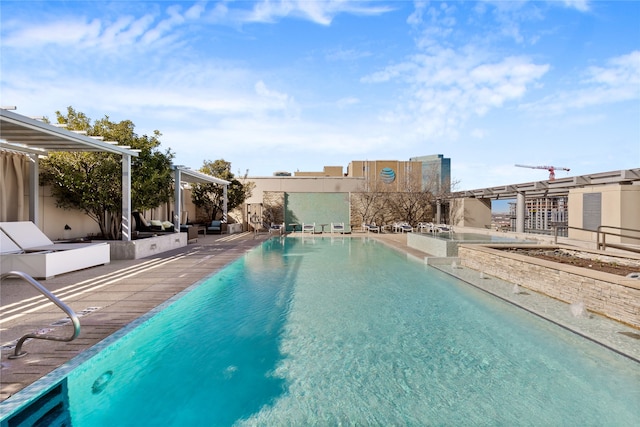 view of pool featuring a patio