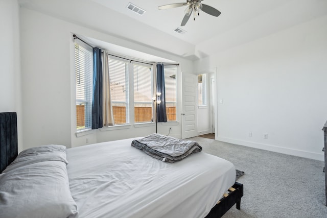 carpeted bedroom with ceiling fan