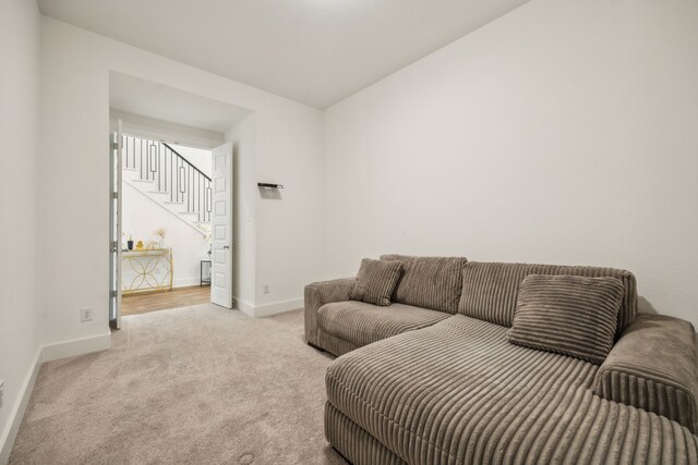 4707 Pin Oak Ct, Aubrey, TX 76227 - carpeted living area with baseboards and stairs