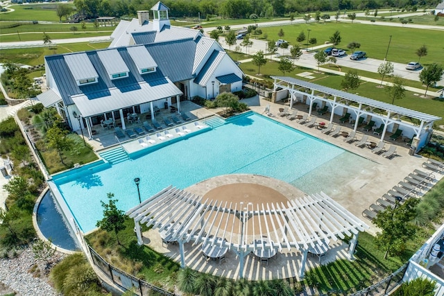 view of pool featuring a patio