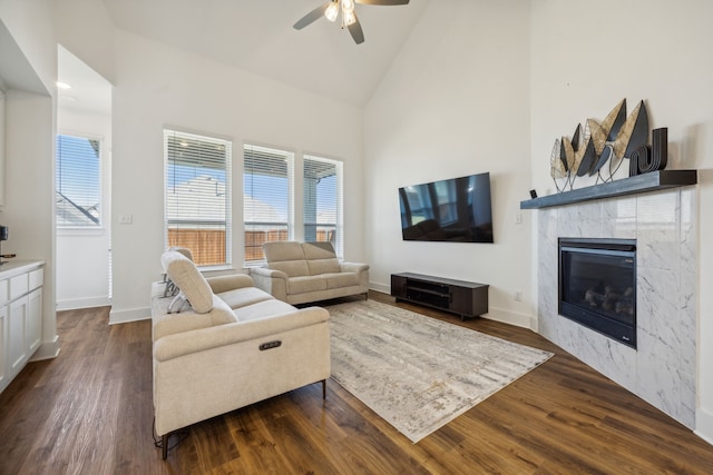 4707 Pin Oak Ct, Aubrey, TX 76227 - living area featuring a healthy amount of sunlight, high vaulted ceiling, ceiling fan, and dark wood-style floors