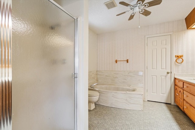 full bathroom featuring plus walk in shower, toilet, vanity, a textured ceiling, and ceiling fan