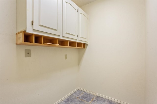 laundry room featuring carpet flooring