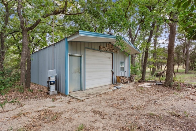 view of outbuilding with a garage