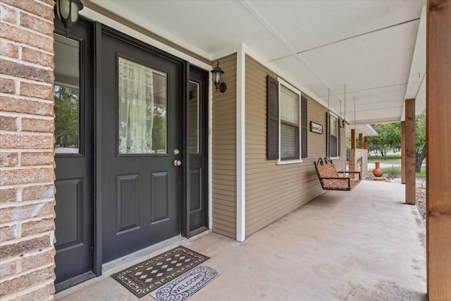 entrance to property with covered porch