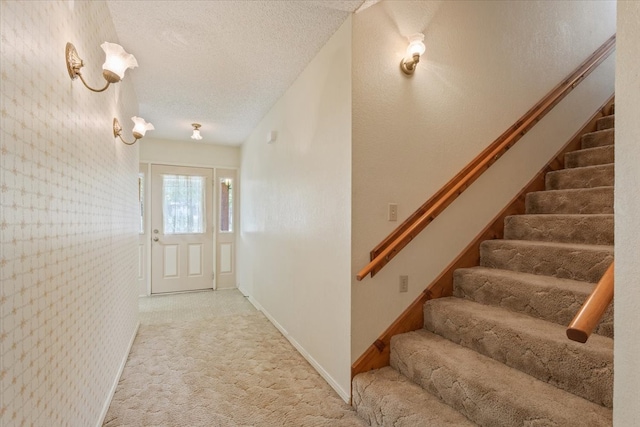 interior space featuring a textured ceiling