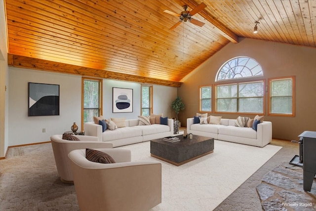 living room featuring ceiling fan, wooden ceiling, carpet floors, and a wealth of natural light