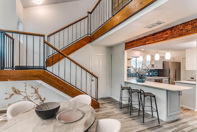 staircase featuring hardwood / wood-style flooring