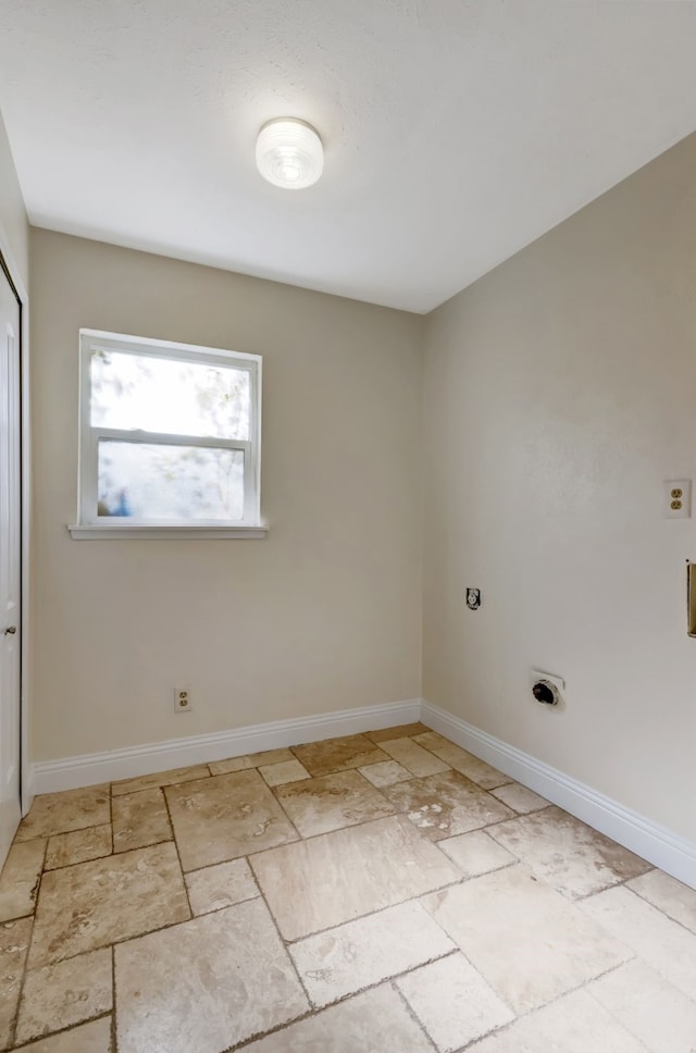 clothes washing area featuring hookup for an electric dryer