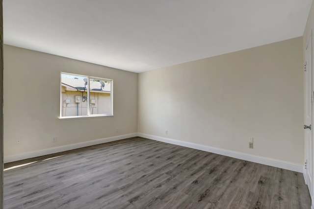 empty room with light hardwood / wood-style floors