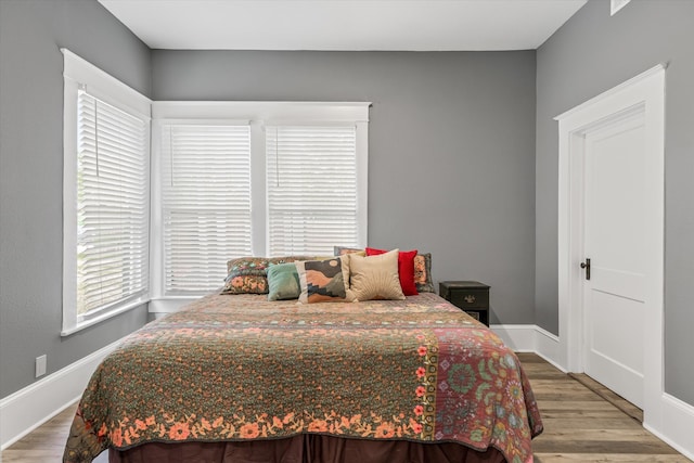 bedroom featuring hardwood / wood-style flooring