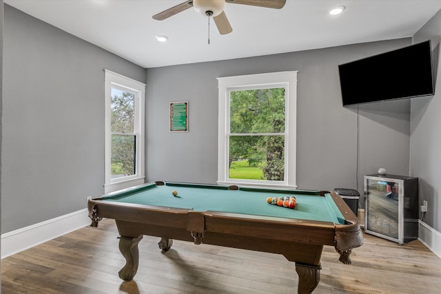 rec room with pool table, hardwood / wood-style flooring, and ceiling fan