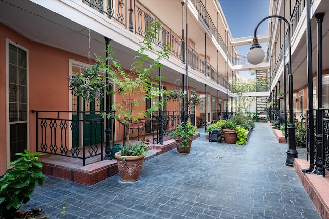 view of property's community featuring a patio area