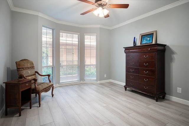 living area with ornamental molding, light hardwood / wood-style flooring, and ceiling fan