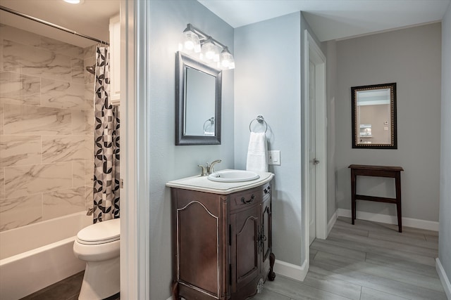 full bathroom featuring vanity, toilet, shower / bathtub combination with curtain, and wood-type flooring