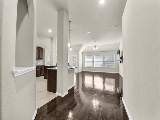 interior space featuring light wood-type flooring and ceiling fan