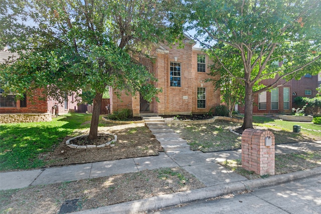 view of front facade with a front lawn