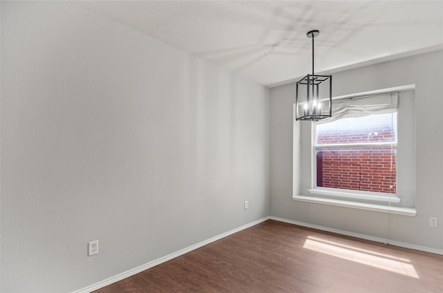 unfurnished dining area featuring hardwood / wood-style flooring