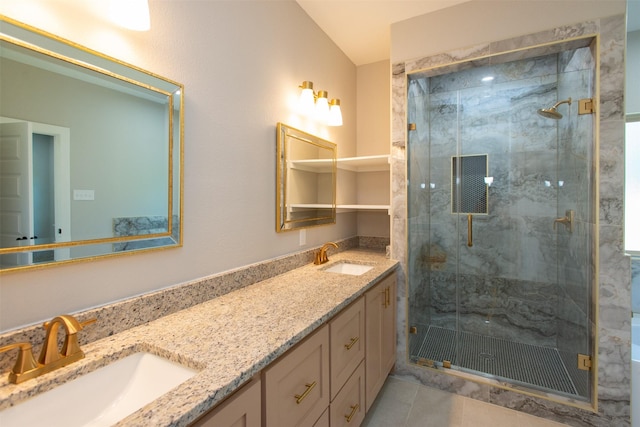 bathroom with vanity, tile patterned flooring, and walk in shower