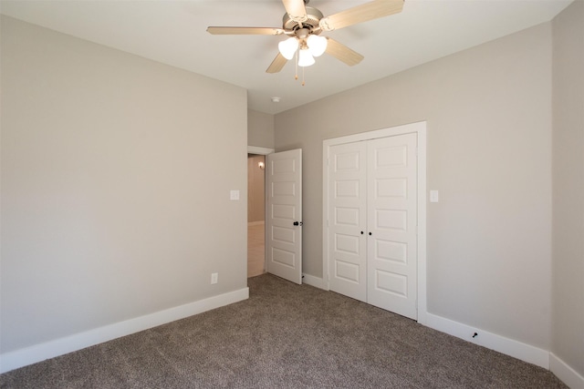 unfurnished bedroom with carpet floors, a closet, and ceiling fan