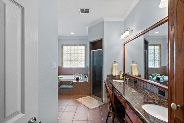 bathroom with vanity, plus walk in shower, tile patterned floors, and a wealth of natural light