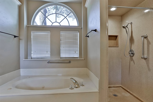 bathroom featuring plus walk in shower