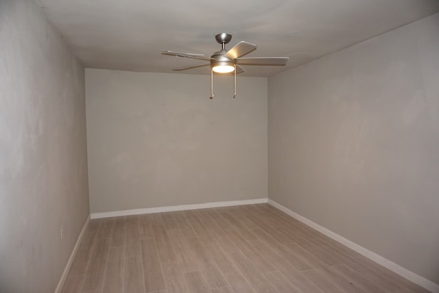 unfurnished room featuring light hardwood / wood-style flooring and ceiling fan