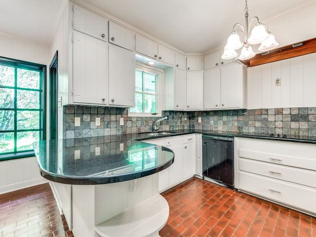 kitchen with black appliances, sink, decorative light fixtures, white cabinets, and decorative backsplash