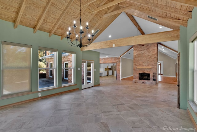 unfurnished living room with wood ceiling, a fireplace, and beamed ceiling