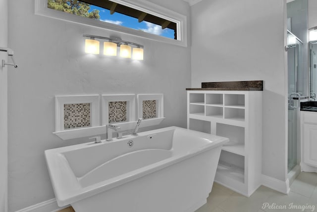 bathroom with tile patterned floors and a bathtub