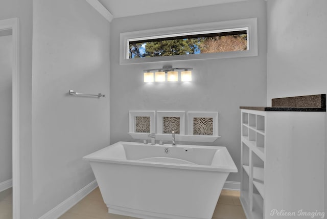 bathroom featuring a bathtub and tile patterned floors