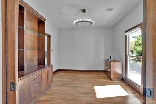 empty room featuring light hardwood / wood-style floors