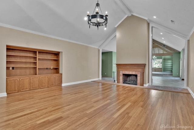 unfurnished living room featuring crown molding, vaulted ceiling with beams, a notable chandelier, and light hardwood / wood-style flooring