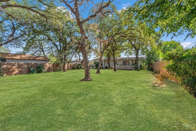 view of yard with a deck