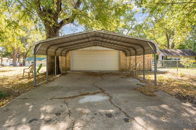 view of parking featuring a garage and a carport