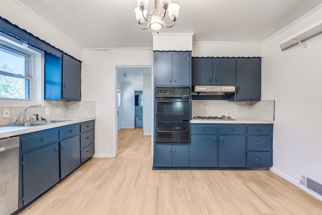 kitchen featuring ornamental molding, sink, appliances with stainless steel finishes, and decorative backsplash