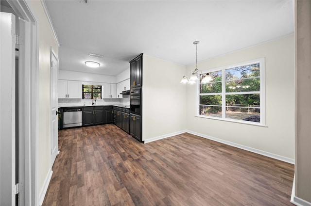 kitchen with oven, dark wood-type flooring, sink, a notable chandelier, and stainless steel dishwasher