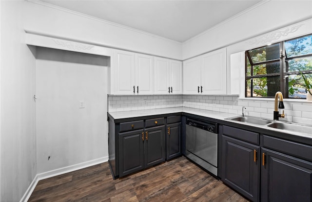 kitchen with stainless steel dishwasher, sink, white cabinets, and dark wood-type flooring