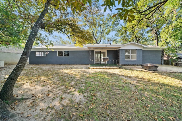 ranch-style house with a front yard