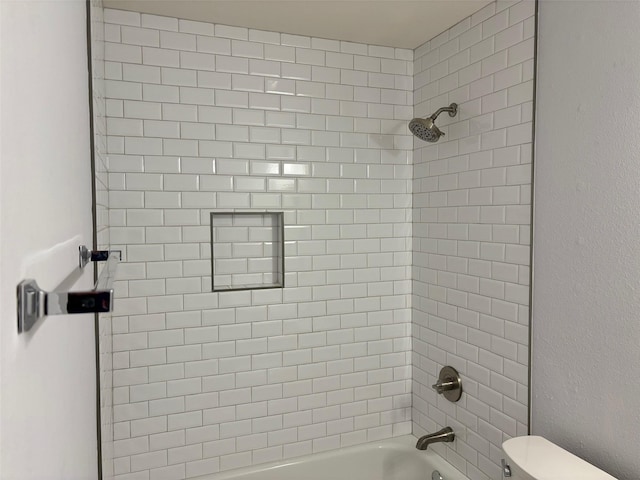 1413 Val Verde Ct, Denton, TX 76210 - bathroom featuring toilet and shower / washtub combination