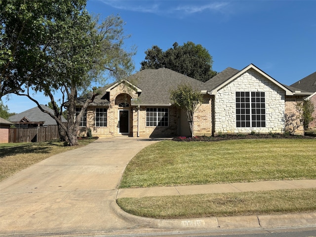 view of front of house with a front lawn