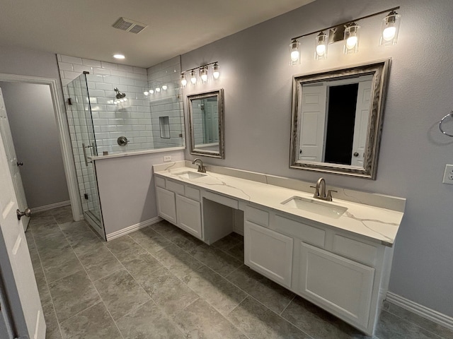 bathroom with vanity and walk in shower